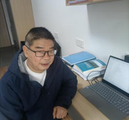 周春临，高级工程师、副教授